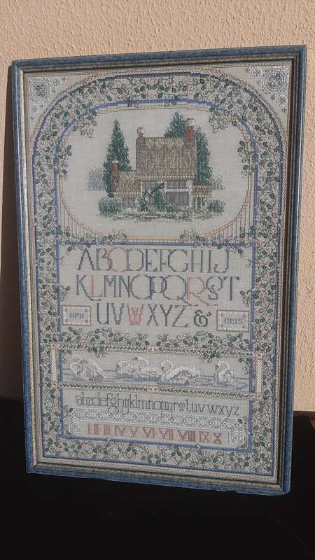 Beautiful cross stitch sampler - framed behind glass 45 x 31 cm