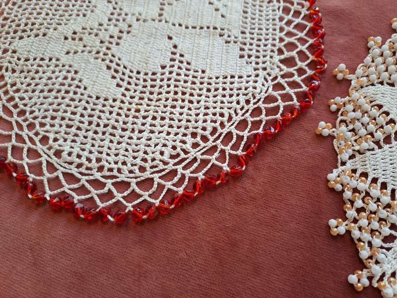 Two vintage beaded doilies - 19cm diameter
