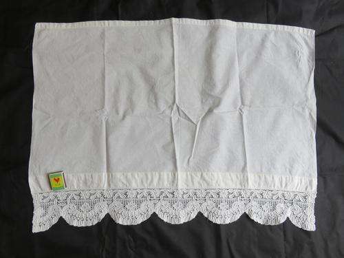 Cloth  with machine lace edge