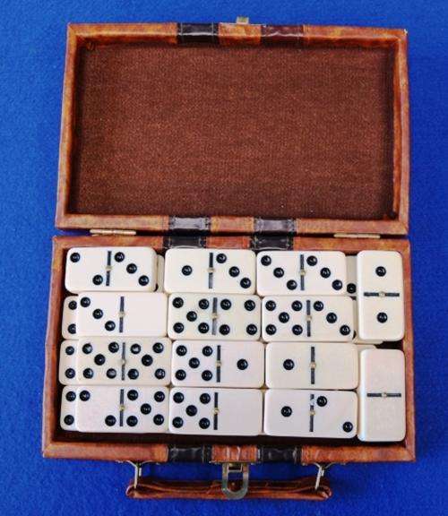 Vintage Dominos in a leather covered carry case