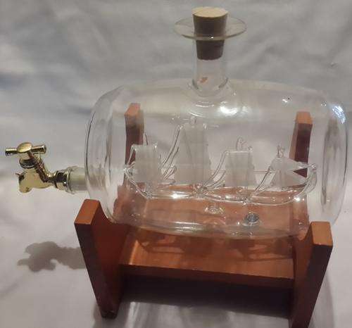 Glass Ship in in a Glass Barrel with Tap and filler cork on wooden stand
