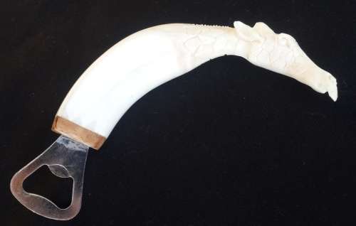 Warthog Tusk Carved Giraffe bottle opener