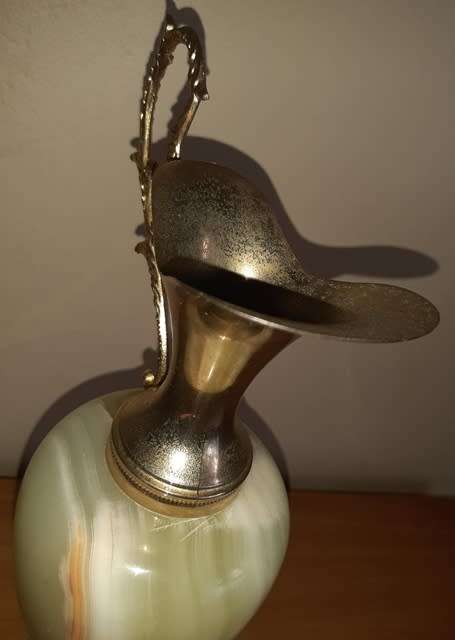 Natural Onyx Italian vase with brass coloured top handle and base has small crack in brass top piece