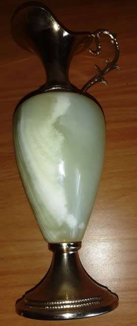 Natural Onyx Italian vase with brass coloured top handle and base has small crack in brass top piece