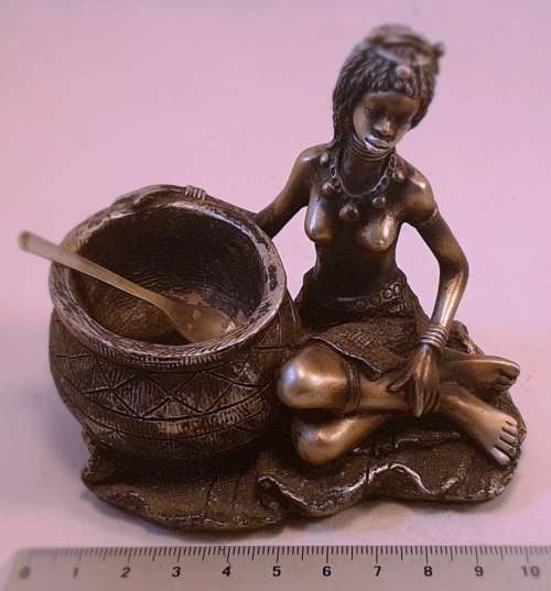 Bronze colour African lady with cooking pot and spoon