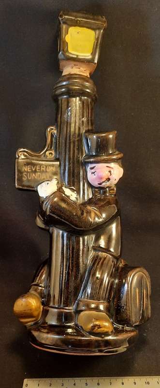 Vintage Decanter Ceramic porcelain Drunk Hanging on lamp post Royal Avon Hight 26 cm x w 12 cm