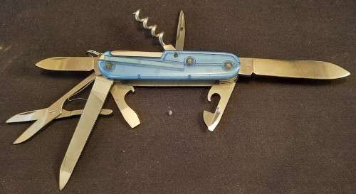Victorinox - Mountaineer with Blue Translucent Scales Older model with grooved corkscrew