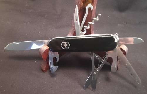 Victorinox Swiss Army knife (Huntsman) with one camo scale and one Black scale