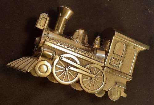 silver coloured Metal coin Bank Steam train money box