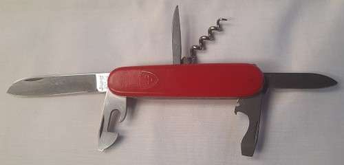 Vintage Elinox -Spartan  Swiss Army Knife With Red Scales Main blade has been reshaped on the tip