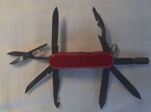 Victorinox mini champ red scales