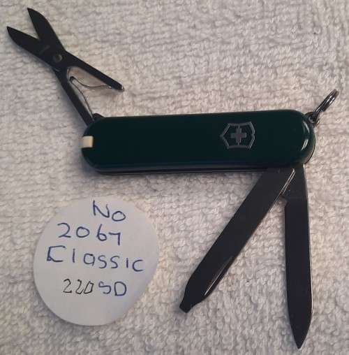 Swiss Army Knife .Victorinox- Classic  SD Dark Green  scales with logo 58 mm
