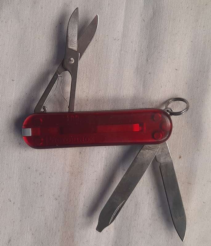 Victorinox Swiss Army Knife - Classic sd Red Translucent Scales with red led light with beflex logo