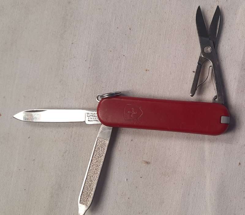Swiss Army Knife .Victorinox- Classic Red Scales 58 mm older model sak logo faded