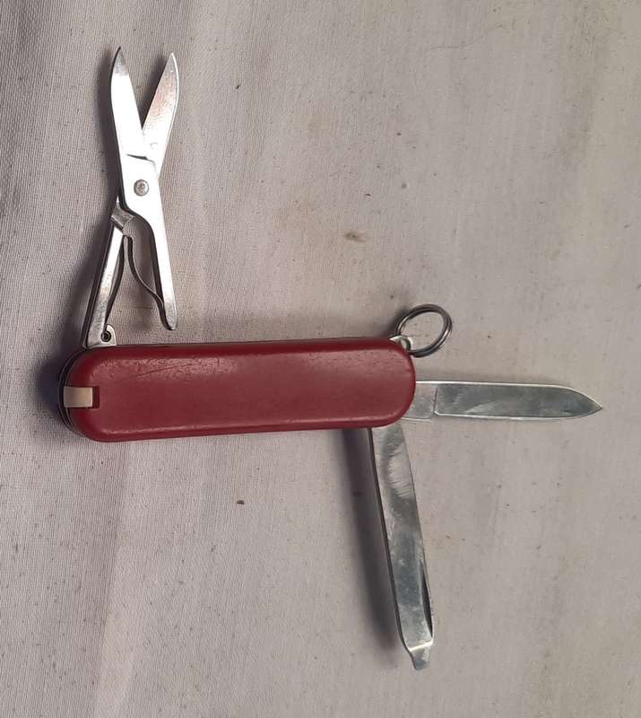 Swiss Army Knife .Victorinox- Classic Red Scales 58 mm older model sak logo faded