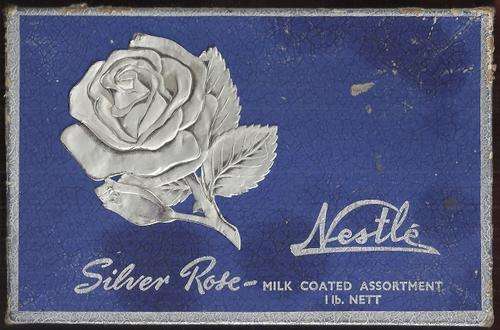 NESTLE "SILVER ROSE" CHOCOLATE BOX WITH CONTENTS. PLEASE VIEW CONTENTS!