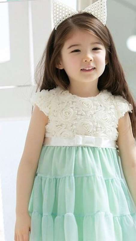 Mint and cream rosette dress available in 3-4 or 4-5 years
