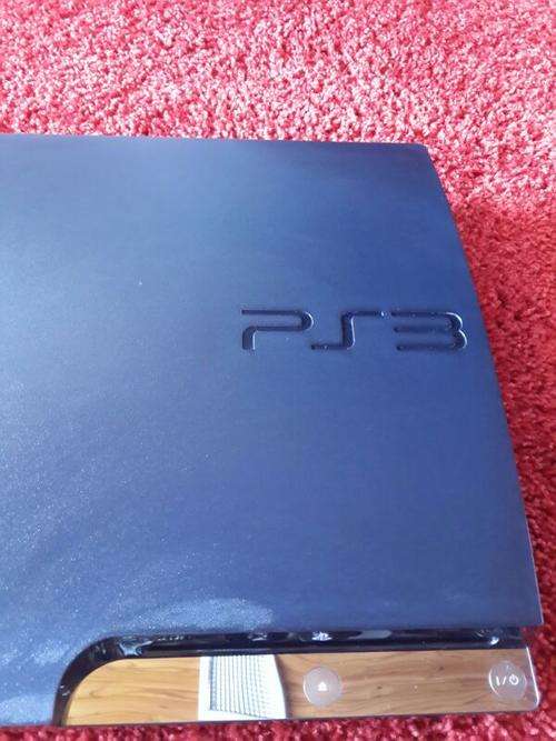 ###320GIG PS3 SLIMLINE WITH LOADS OF GAMES AND 2 CONTROLS###R1 AUCTION NO RESERVE###