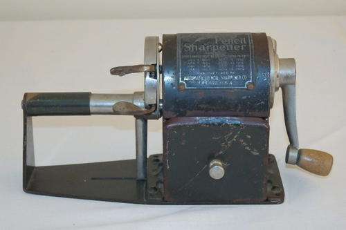 A STUNNING ANTIQUE (c1920's) "DANDY" "AUTOMATIC FEED" PENCIL SHARPENER IN WORKING ORDER