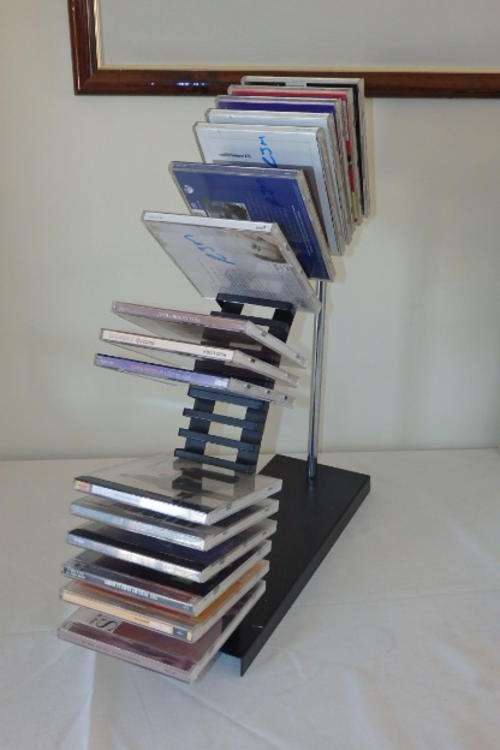A STUNNING "MATT" BLACK AND CHROME "SHAPED" 24 CD HOLDER IN GREAT CONDITION