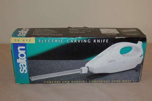 A FANTASTIC BOXED "SALTON" ELECTRIC CARVING KNIFE & INSTRUCTION BOOKLET IN WORKING CONDITION