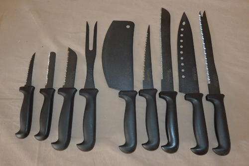 AN FANTASTIC SET OF 9 ORIGINAL NIKKEI KITCHEN KNIVES WITH THE TRADITIONAL TEFLON COATED BLACK BLADES