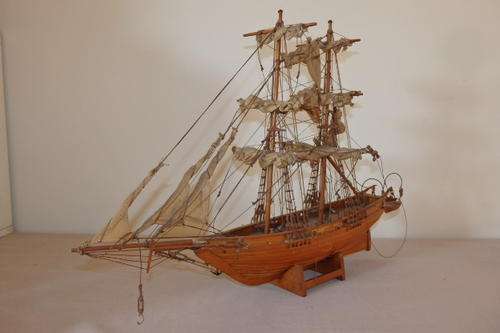 A BEAUTIFULLY DETAILED WOODEN MODEL OF A MAGNIFICENT SAILING SHIP. BEAUTIFUL ON DISPLAY!!