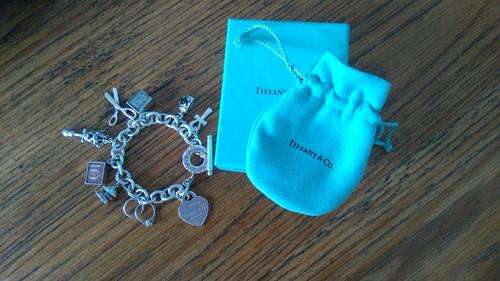 TIFFANY CHARM BRACELET WITH NINE CHARMS