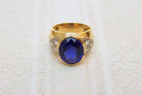 TANZANITE AND DIAMOND DRESS RING IN 18ct