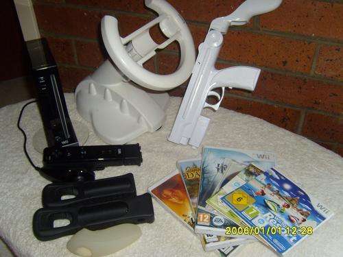 Black Nintendo Wii (w/ Wii-plus remote) Bundle for sale - many extras!