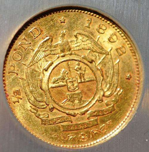 1892 HALF POND AU53 22 KARAT GOLD