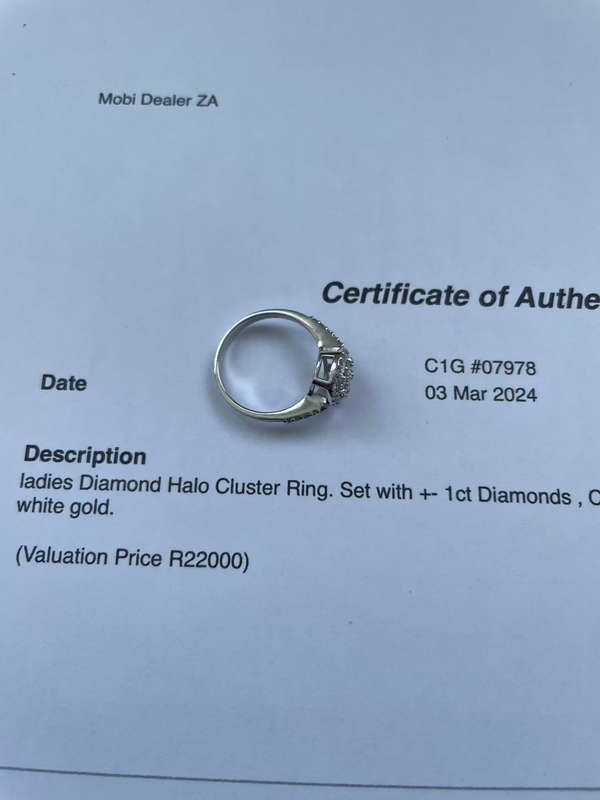 ladies NWJ Diamond Ring. Set with +- 1ct Diamonds, Set in 9ct white gold. With Certificate