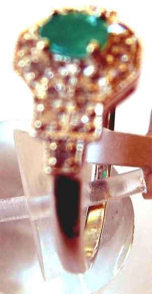 Excusite 925-Sterling Silver Emerald and Genuine Diamonds Ring.