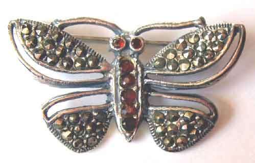 Sterling Silver, Marcasite and Garnets  Brooch.