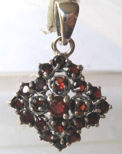 925 Sterling Silver  and Genuine Garnets Pendant