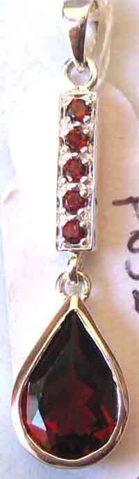 Solid Sterling Silver and Genuine Garnets  Pendant.