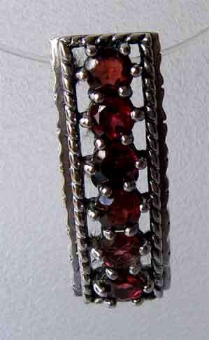 Sterling Silver and Genuine Garnets Pendant