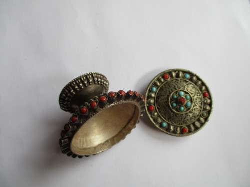 Silver Ornated with coral and turquise box -container .