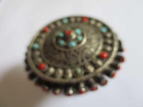 Silver Ornated with coral and turquise box -container .