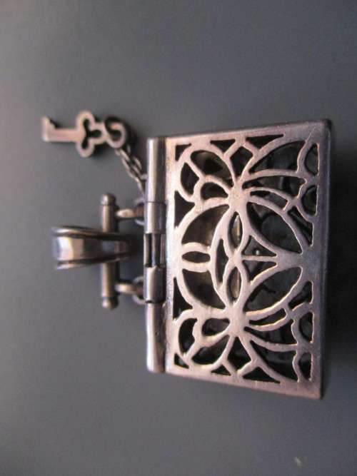 925 Sterling Silver  and Genuine Garnet `purse `/ Pendant