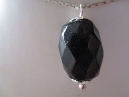 925 Sterling Silver and Black Onyx   Pendant on Chain .