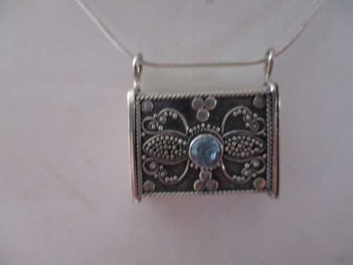 925 Sterling Silver and Bllue Topaz `Purse`/ Pendant on Strling Chain .