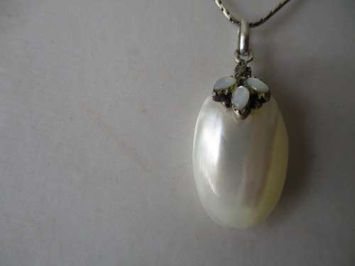 925 Sterling Silver moonstones and Shell Pendant.