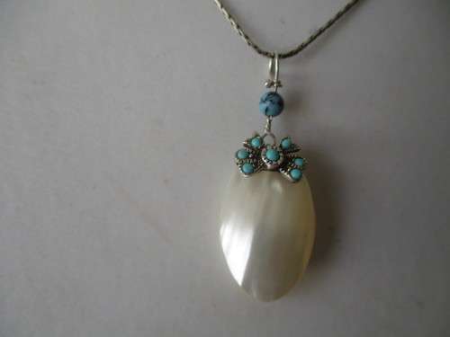 925 Sterling Silver Shell and Genuine Turquoise Pendant.