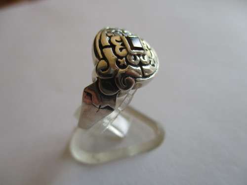 925 Sterling Silver and Genuine Garnet Ring.