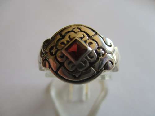 925 Sterling Silver and Genuine Garnet Ring.