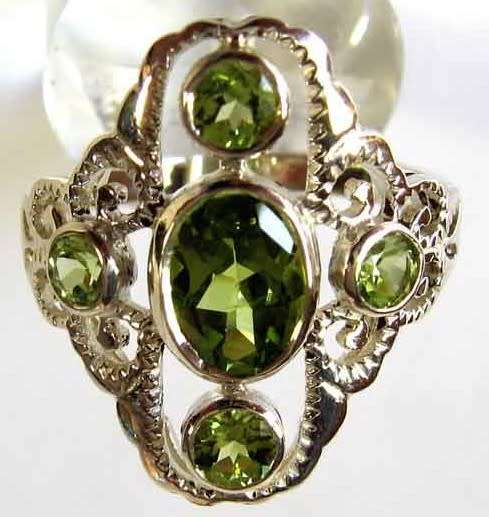 925 Sterling Silver and Peridots Ring.