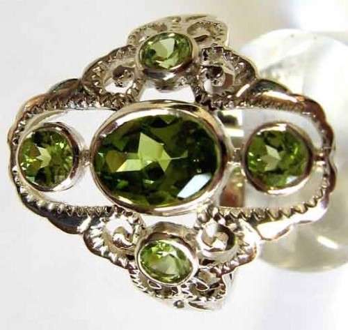 925 Sterling Silver and Peridots Ring.