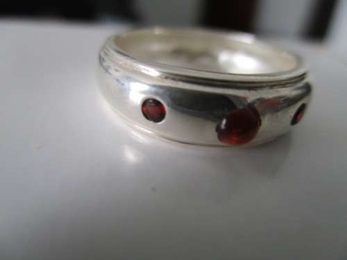 solid,  Sterling Silver  and Genuine Garnets Ring.