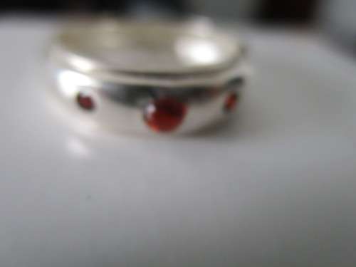 solid,  Sterling Silver  and Genuine Garnets Ring.